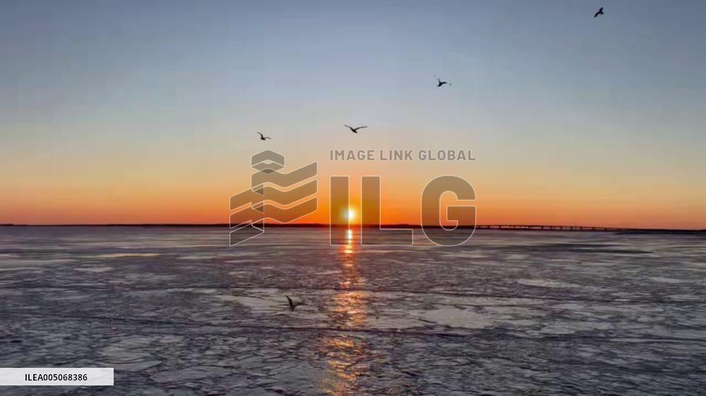 US: Stunning Sunrise Over Icy Jersey Shore Following Powerful Arctic Front