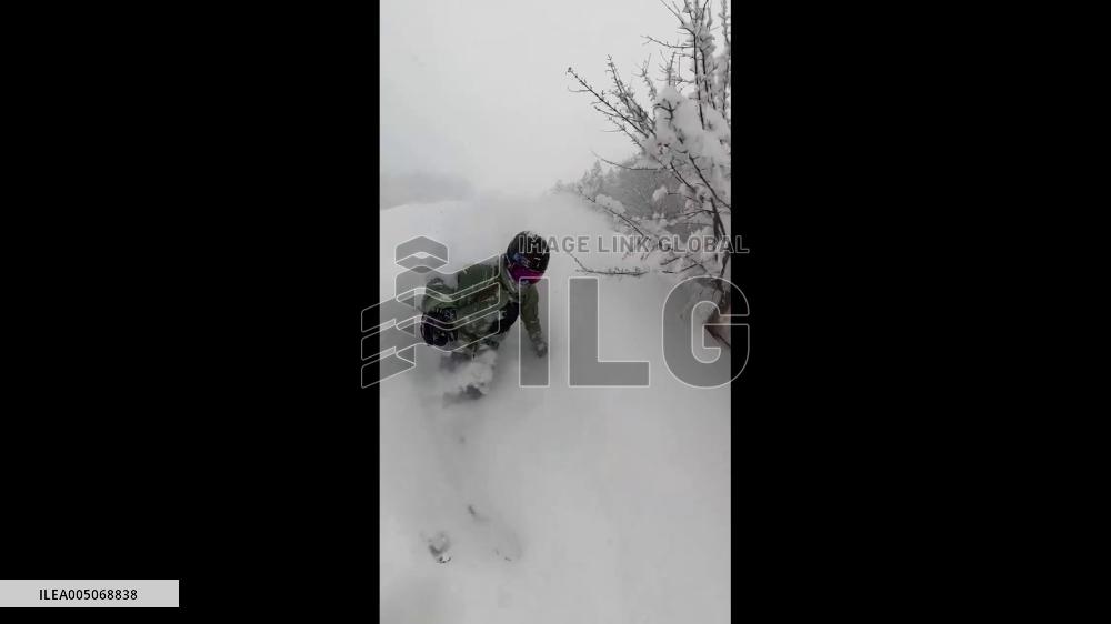 Japan: Skier Powers Through Waist-Deep Snow at Ski Resort in Hyogo