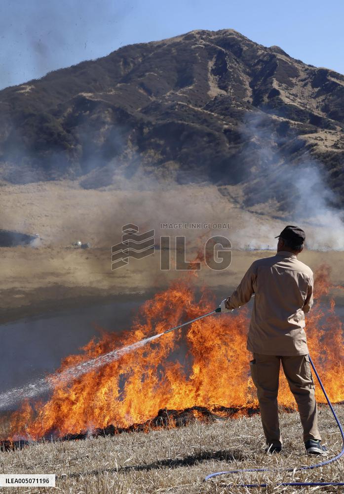 Controlled grassland burn on Mt. Aso