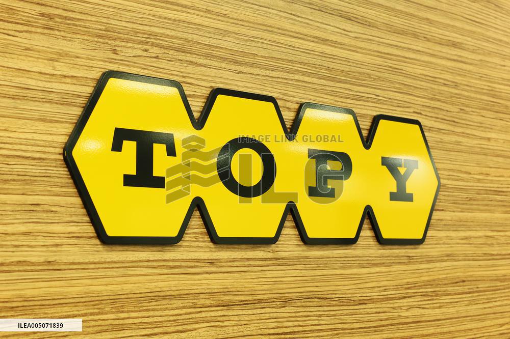 Topy Industries signboard and logo