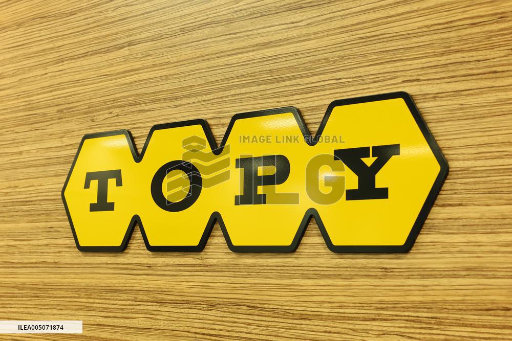 Topy Industries signboard and logo