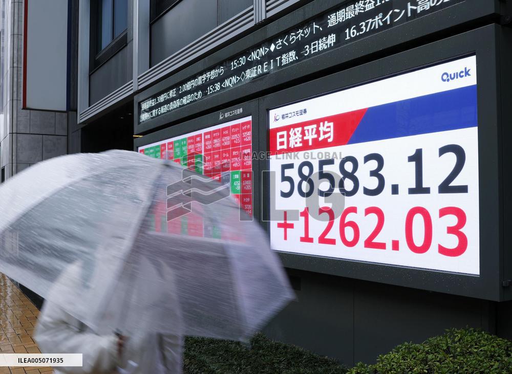 Nikkei stock index ends at record high