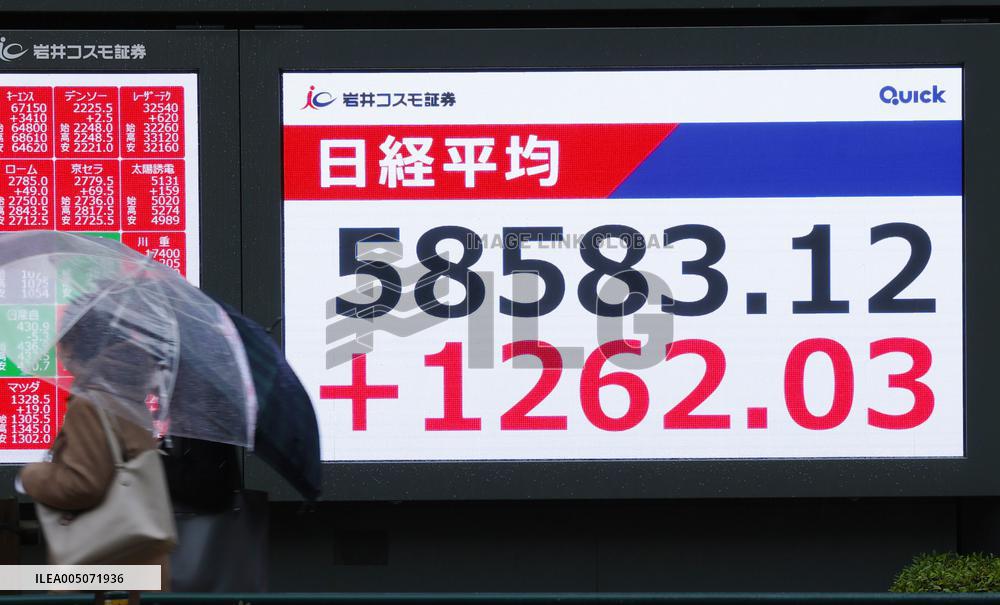 Nikkei stock index ends at record high