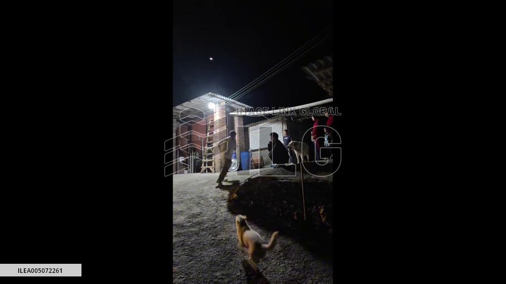 China: Family Smashes Through Concrete Road With Excavator to Rescue Trapped Pet Dog