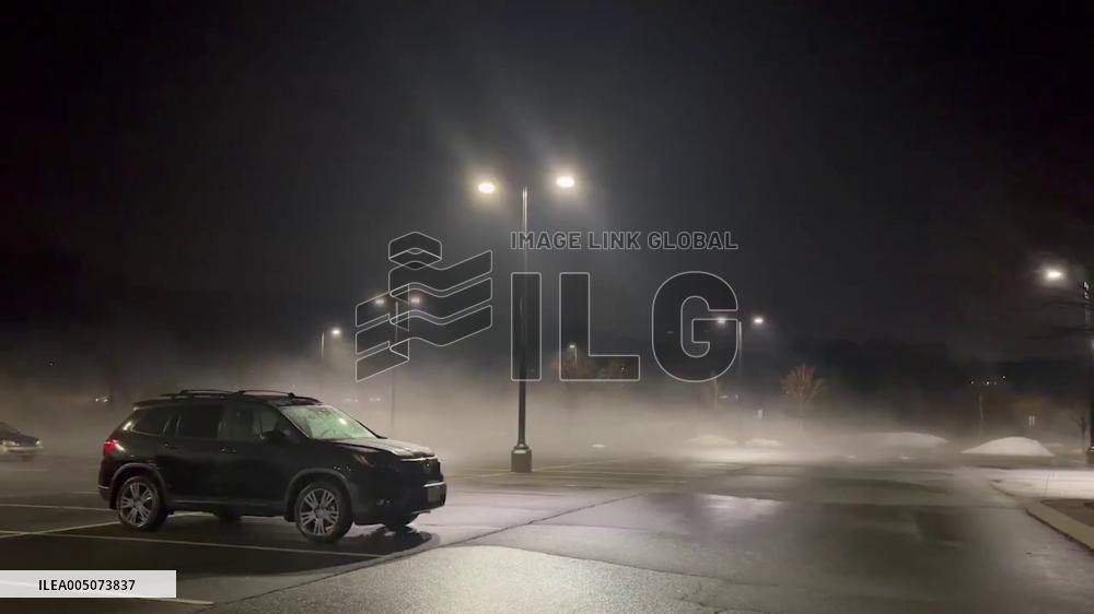 US: Rising Temperatures Cause Steam to Billow From Snow Piles New York