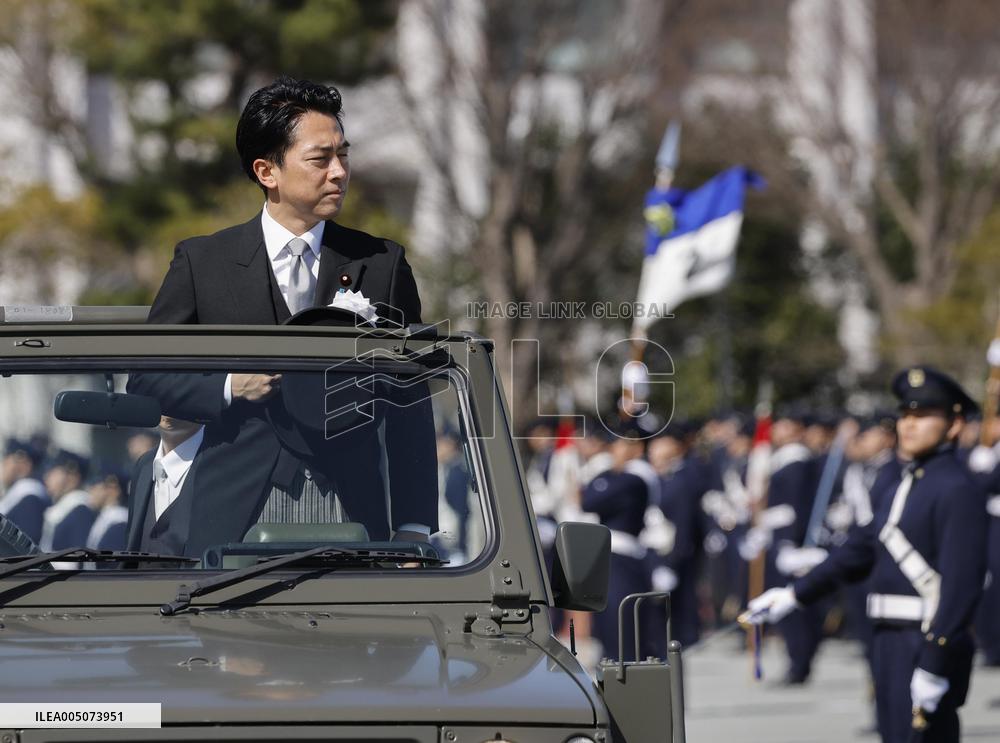 Japan defense chief attends troop inspection ceremony