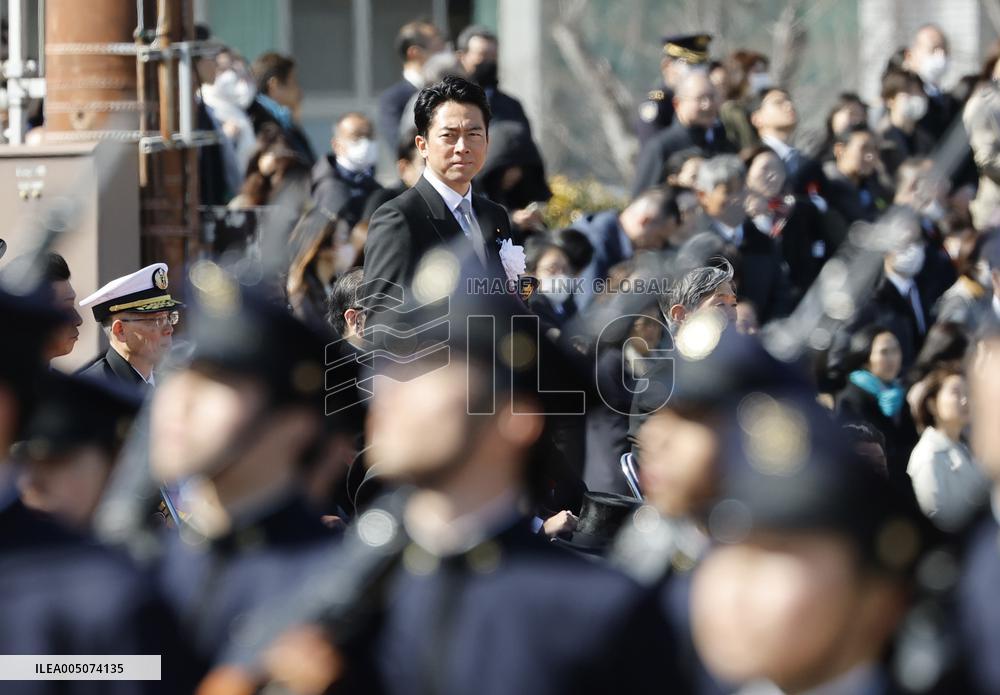 Japan defense chief attends troop inspection ceremony