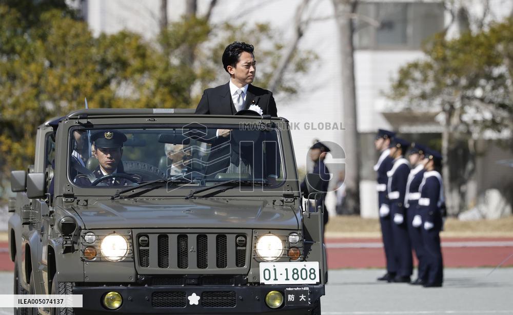 Japan defense chief attends troop inspection ceremony