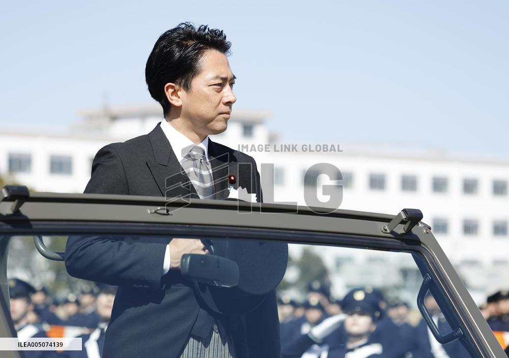 Japan defense chief attends troop inspection ceremony