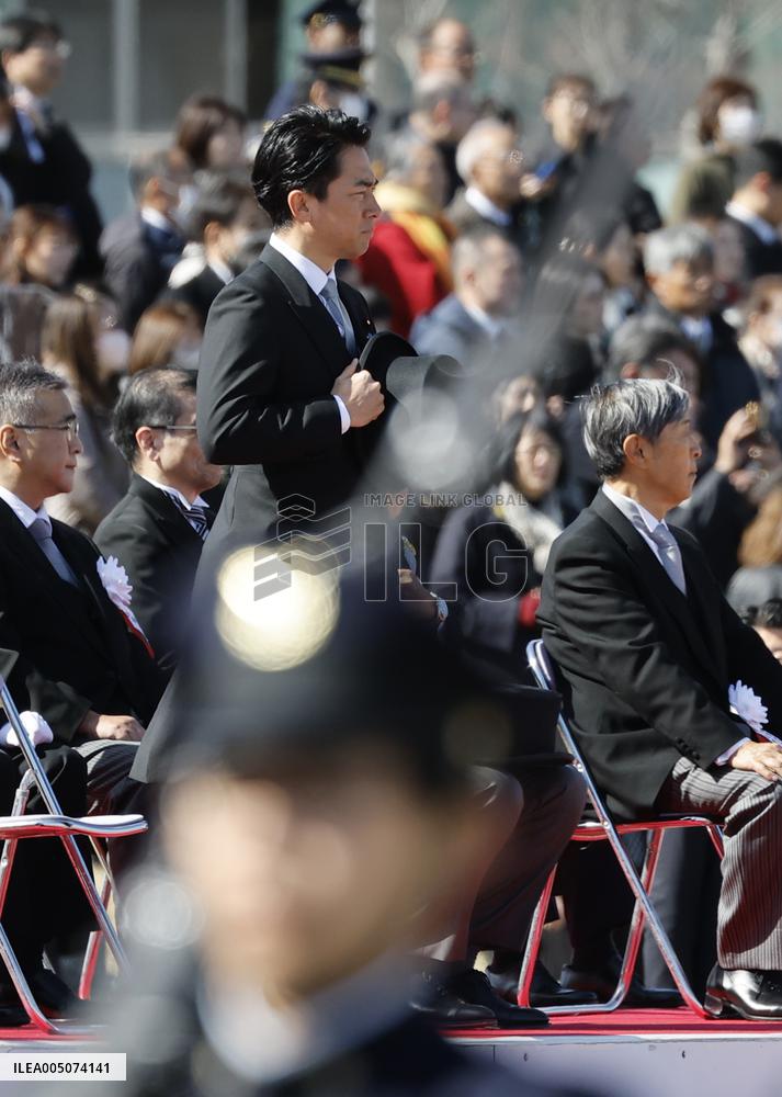 Japan defense chief attends troop inspection ceremony
