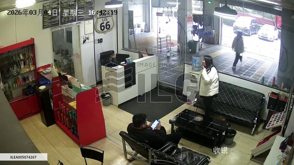 China: Young Girl Accidentally Causes Glass Door to Burst Apart While Opening it