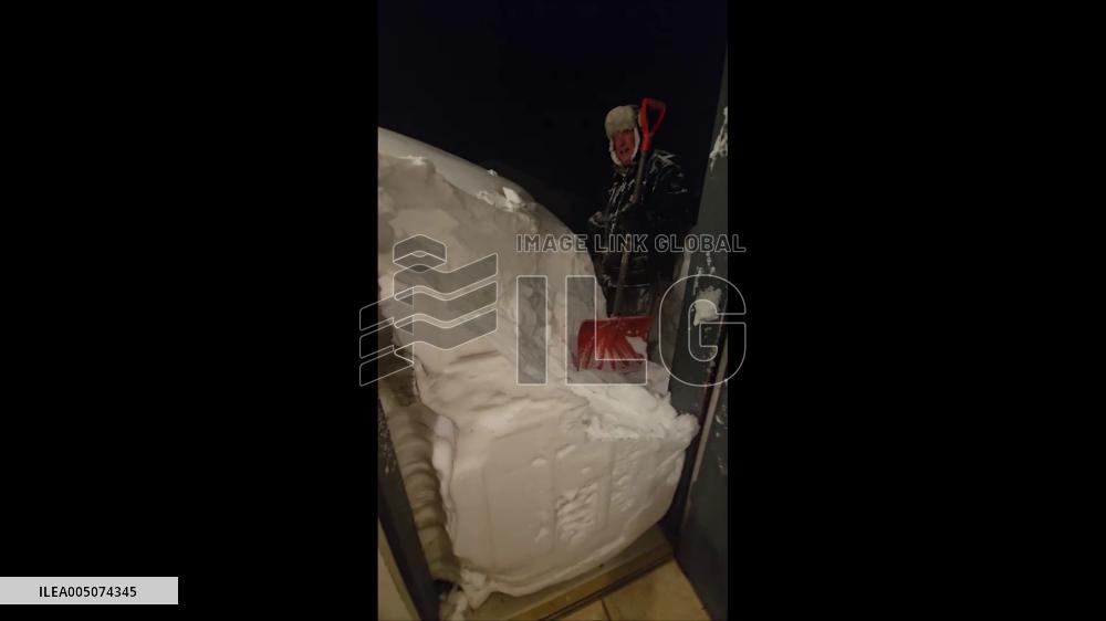 US: Winter Storm Buries Michigan With Record Snow