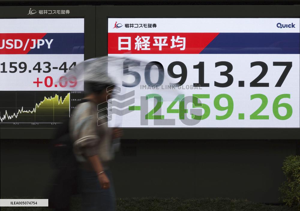 Tokyo stocks tumble