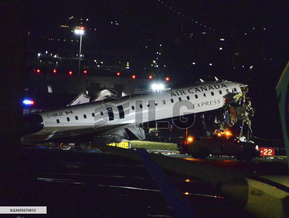 Jet collides with fire truck at LaGuardia Airport