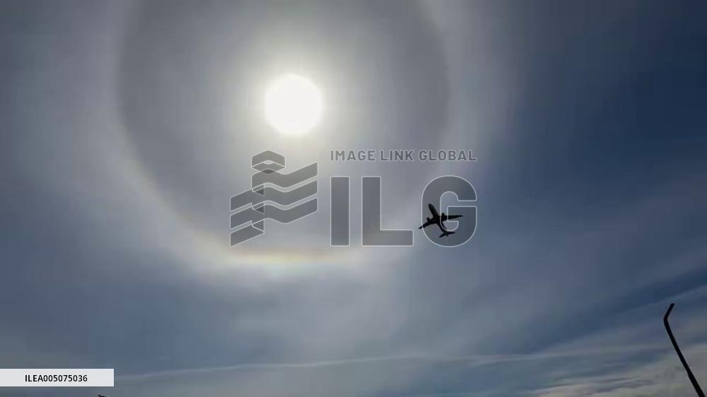 US: Stunning Solar Halo Spotted Over Rochester With Aircraft Passing Through