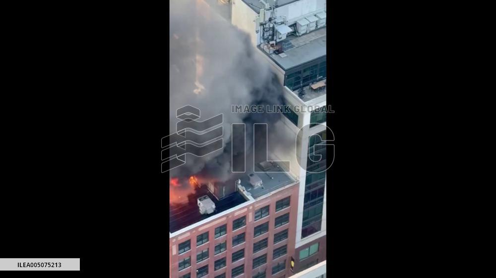 Canada: Rooftop Fire Breaks Out in Downtown Toronto After Possible Propane Explosion 5