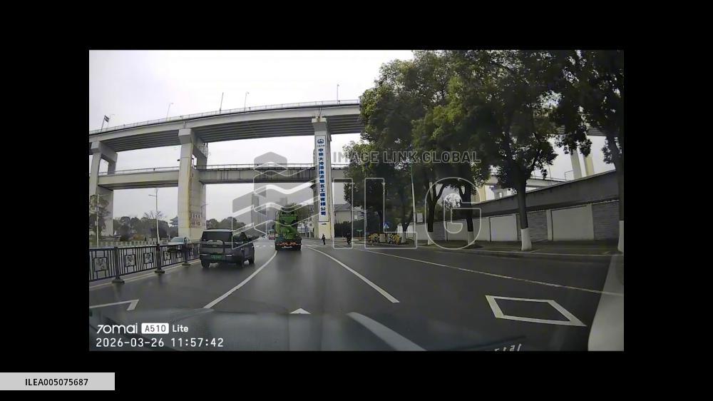 China: Dashcam Captures Truck Rollover at Zebra Crossing in Jiangxi