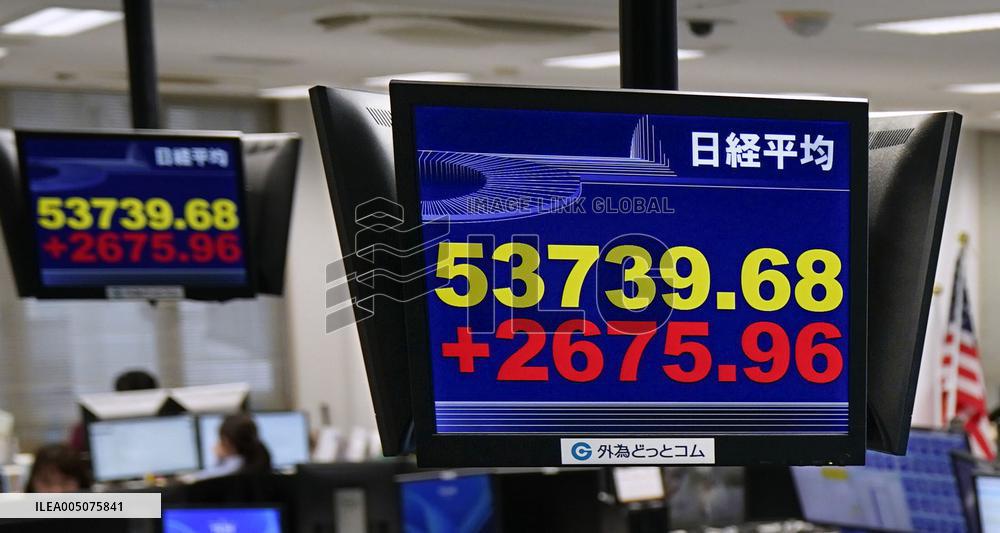 Tokyo stocks surge