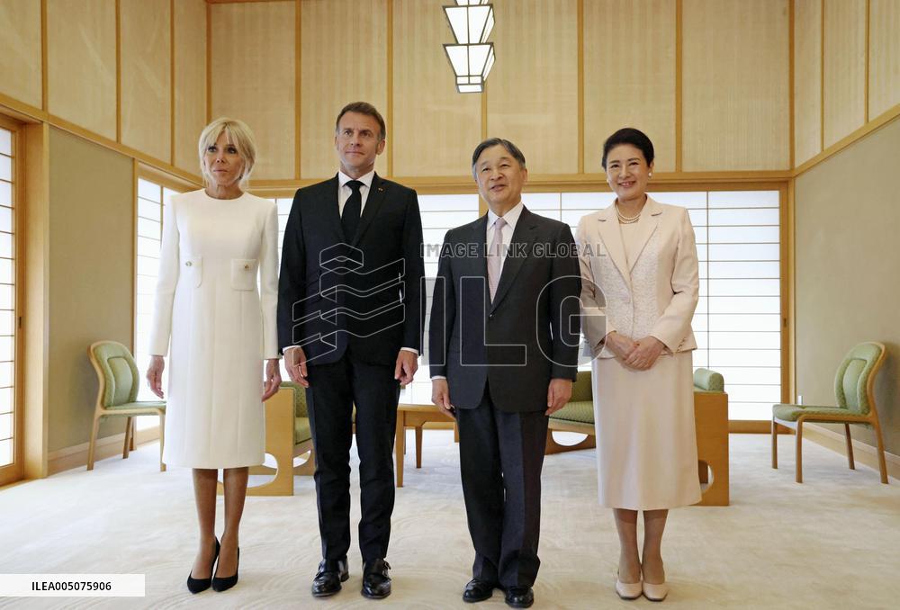 Japan emperor, empress meet with French President Macron, wife