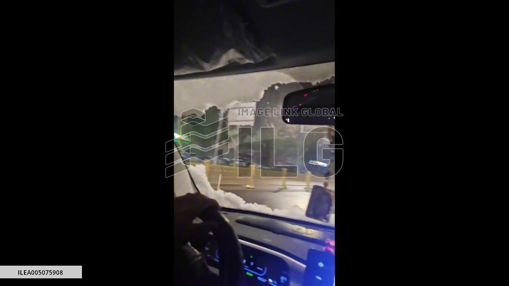 China: Snow Slide Onto Windshield, Blocking Driver’s View