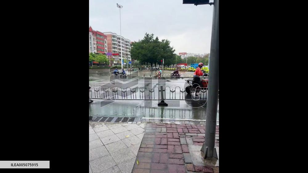 China: Manhole Covers Pop and Dance on Flooded Street After Heavy Rain in Hubei