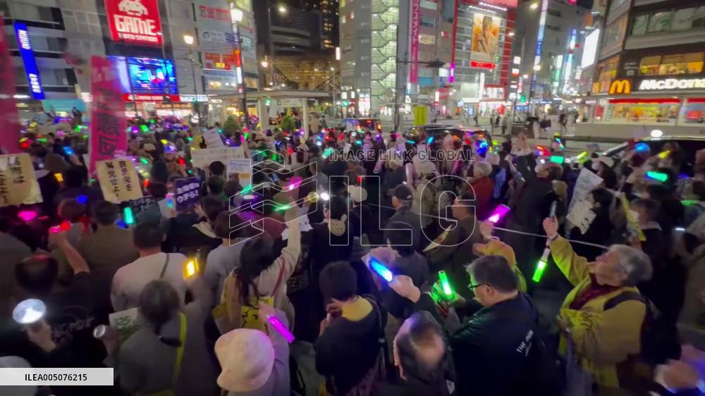 Japan: Thousands Rally in Tokyo Against War and Constitutional Revision, Waving Penlights