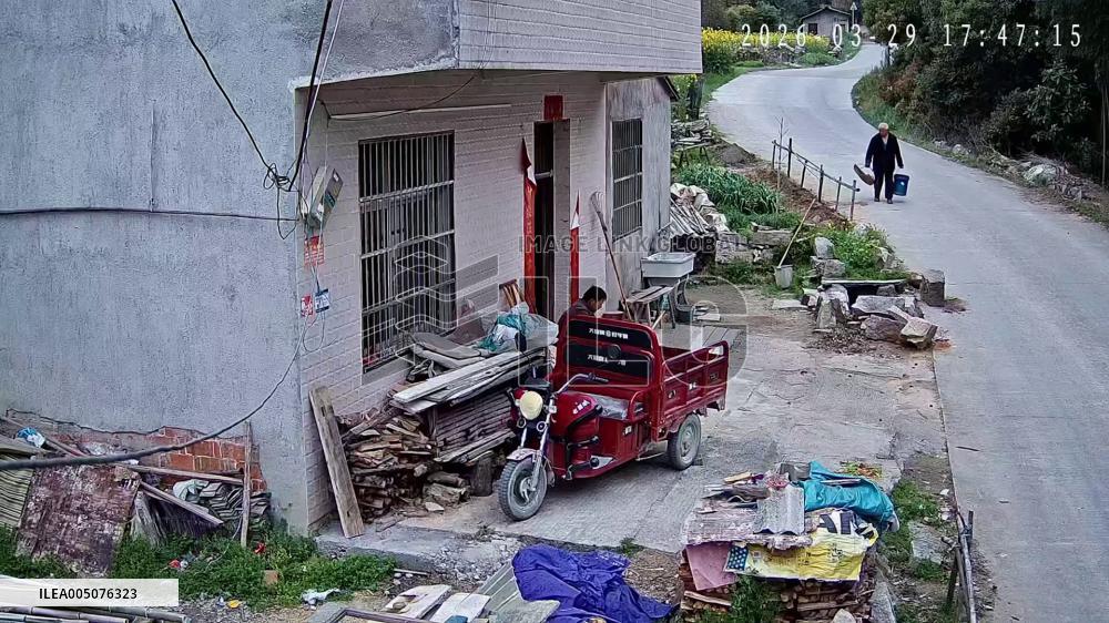 China: Brake Failure Sends Car Plowing Into Courtyard in Hubei