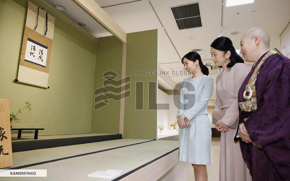 Princesses at flower arrangement exhibition