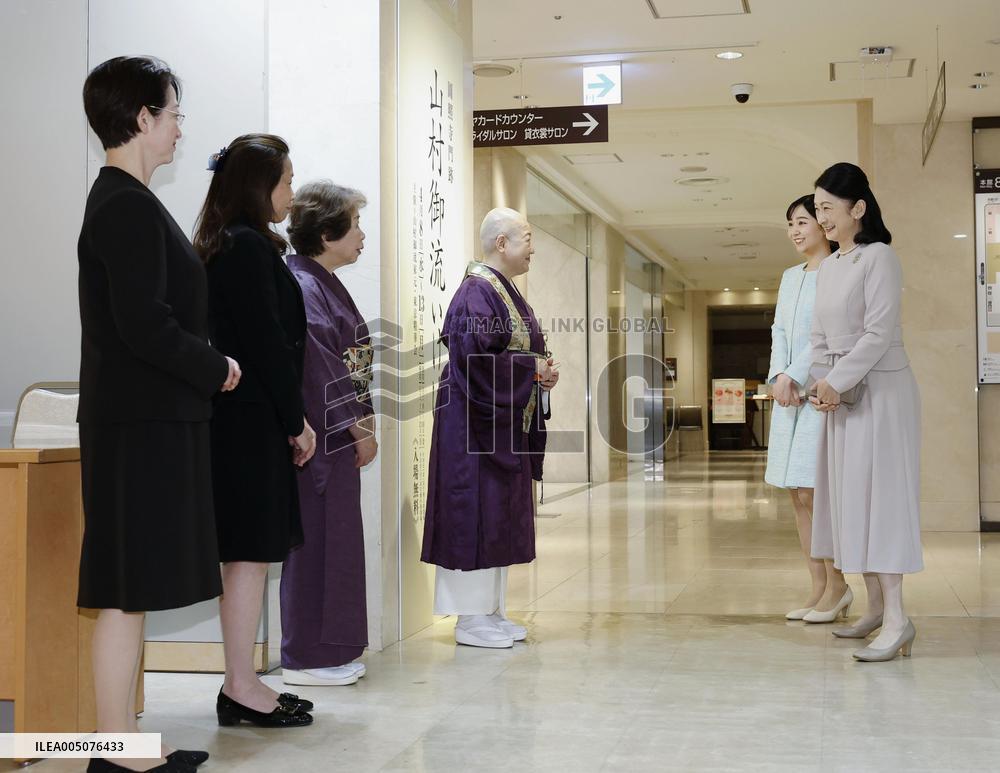 Princesses at flower arrangement exhibition