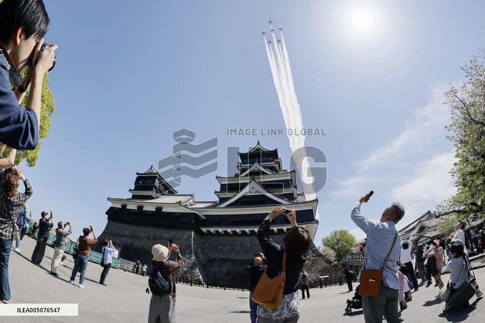 Blue Impulse aerobatic team flies over Kumamoto