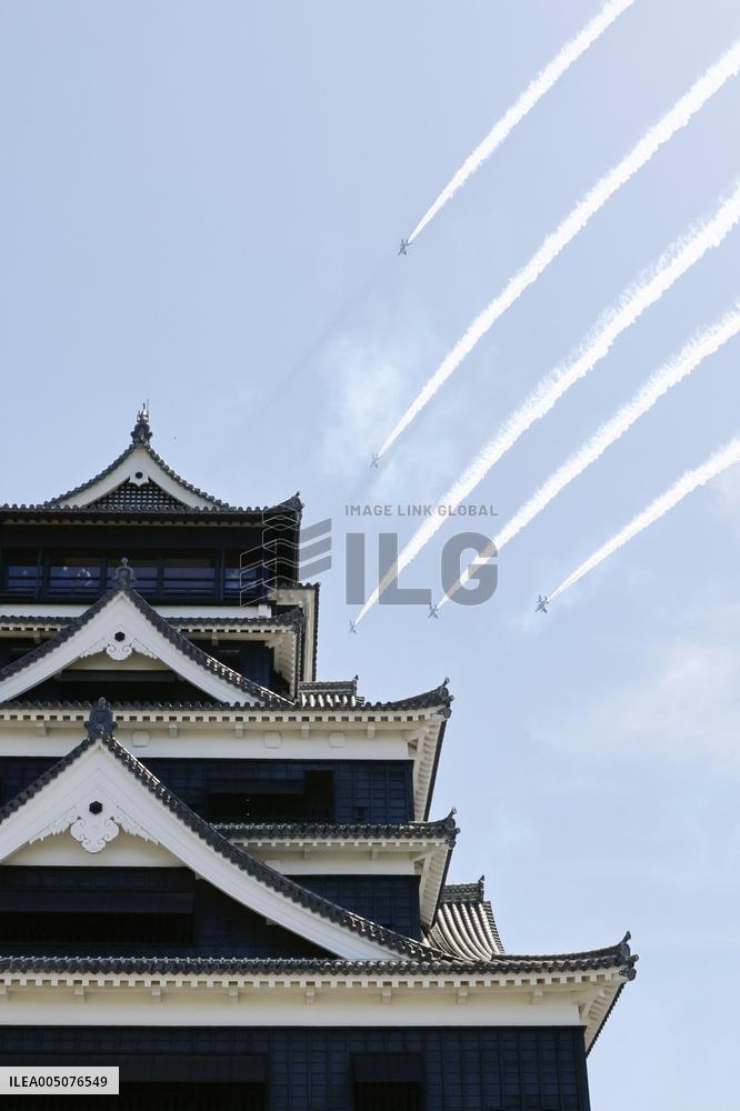 Blue Impulse aerobatic team flies over Kumamoto