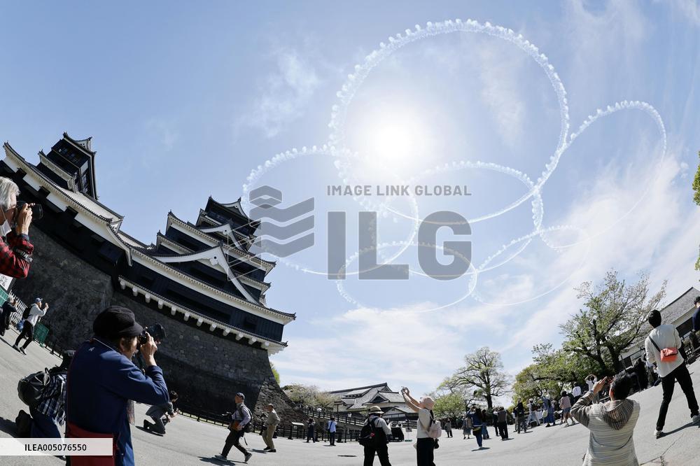 Blue Impulse aerobatic team flies over Kumamoto