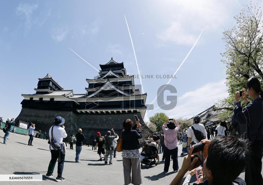 Blue Impulse aerobatic team flies over Kumamoto