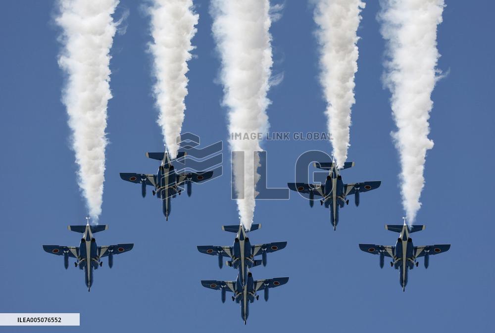 Blue Impulse aerobatic team flies over Kumamoto