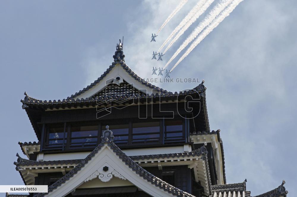 Blue Impulse aerobatic team flies over Kumamoto