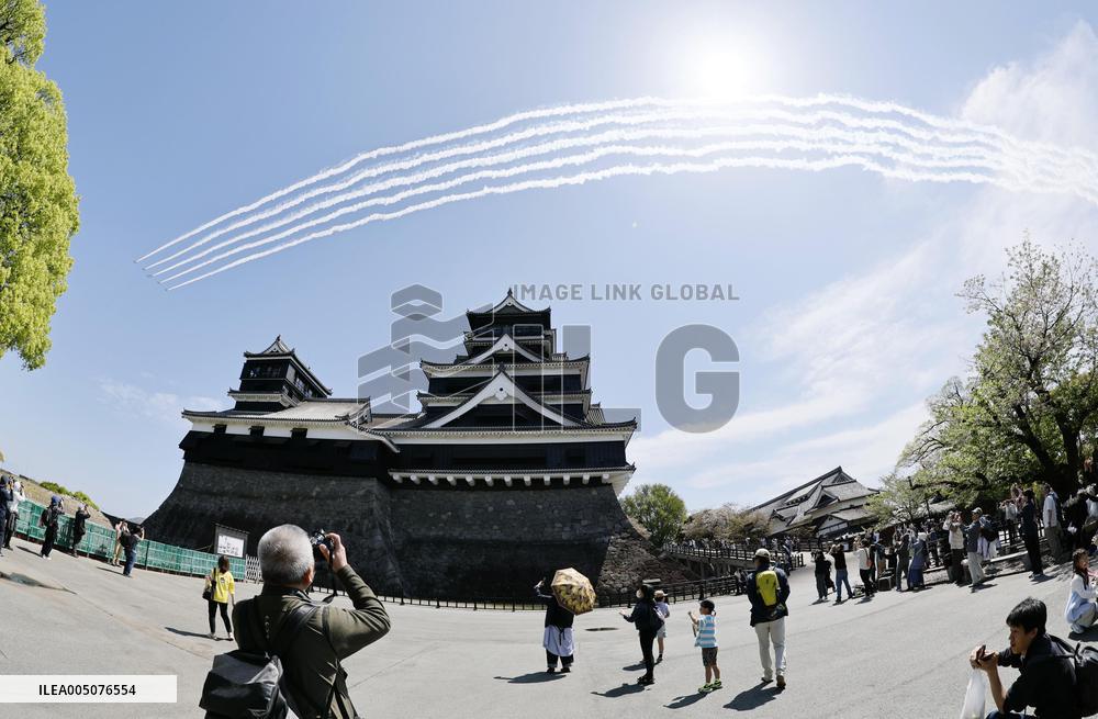 Blue Impulse aerobatic team flies over Kumamoto