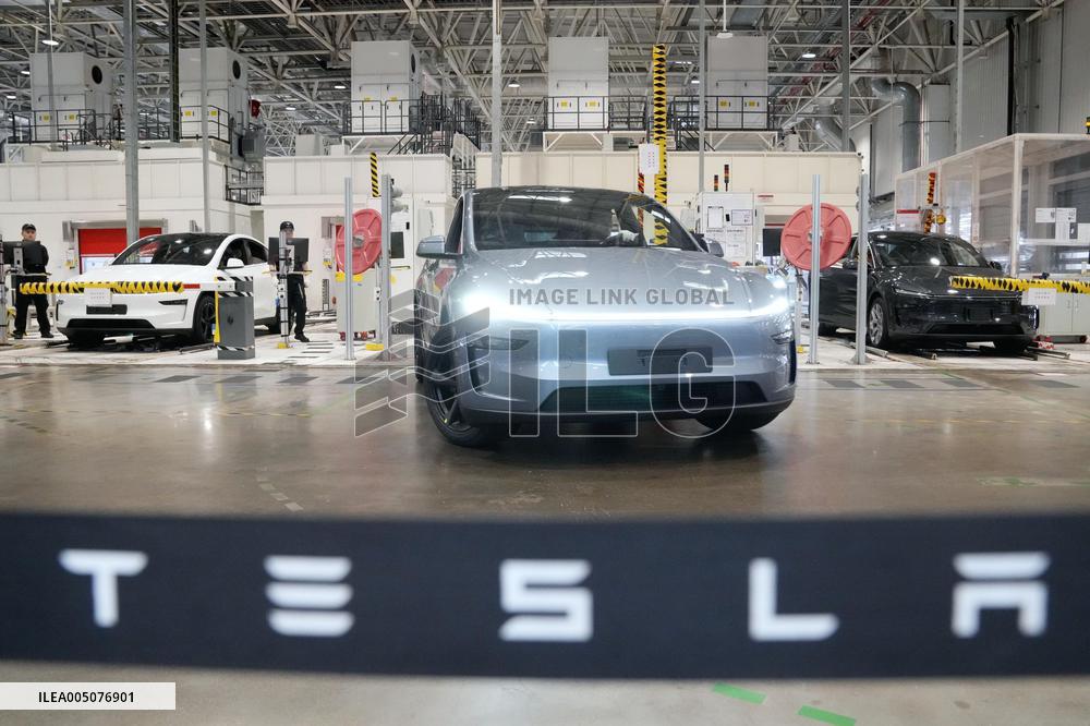 Tesla unveils Shanghai factory to media