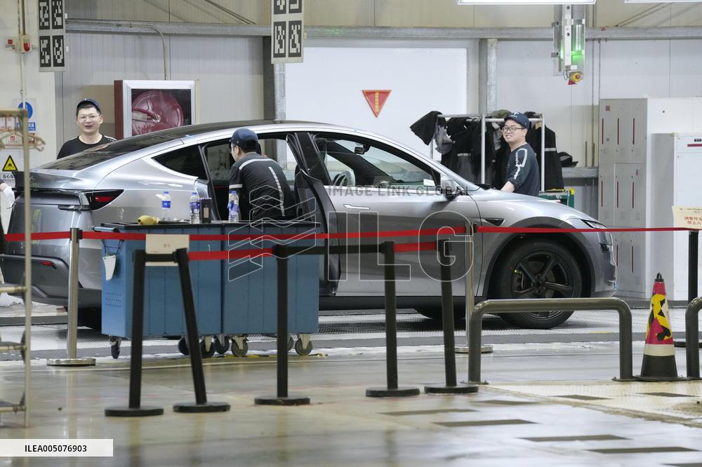 Tesla unveils Shanghai factory to media