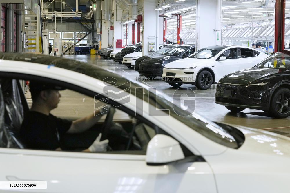 Tesla unveils Shanghai factory to media