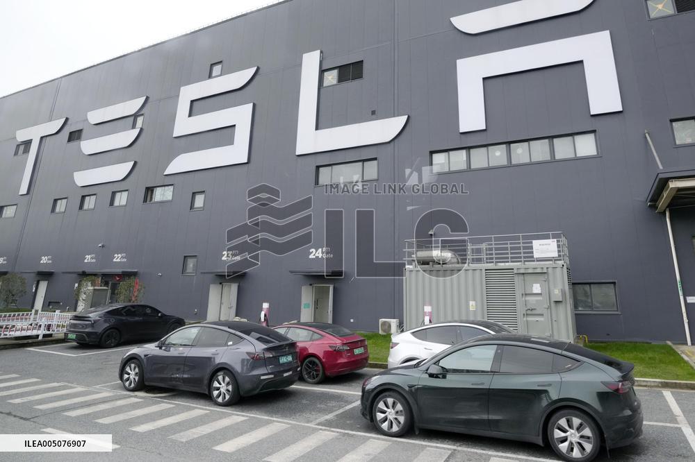 Tesla unveils Shanghai factory to media