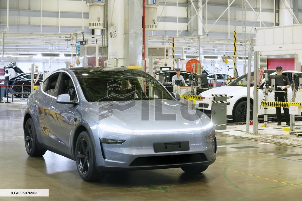 Tesla unveils Shanghai factory to media