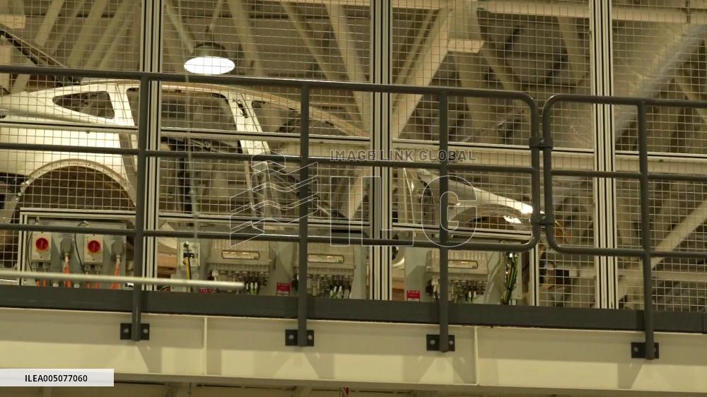 Tesla unveils Shanghai factory to media