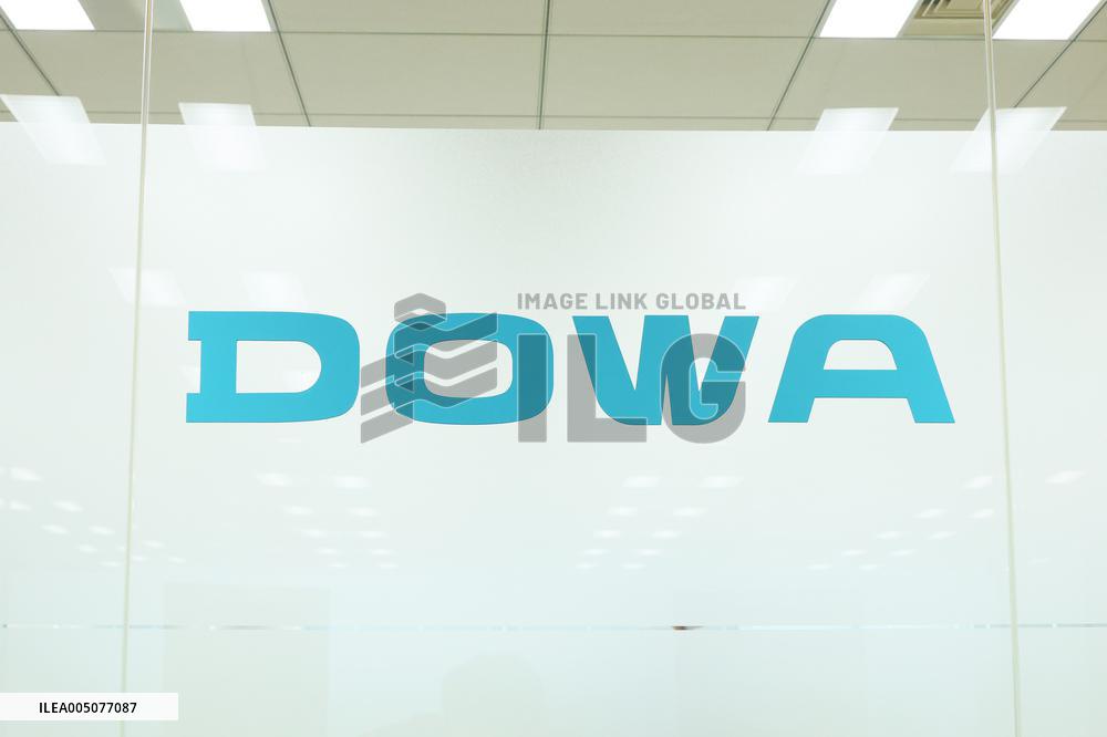 DOWA Holdings sign and logo