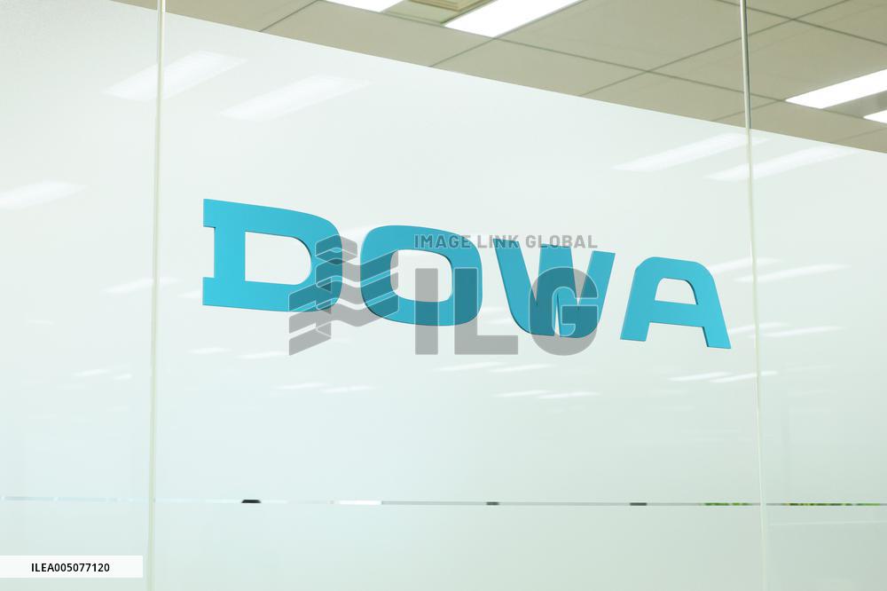 DOWA Holdings sign and logo