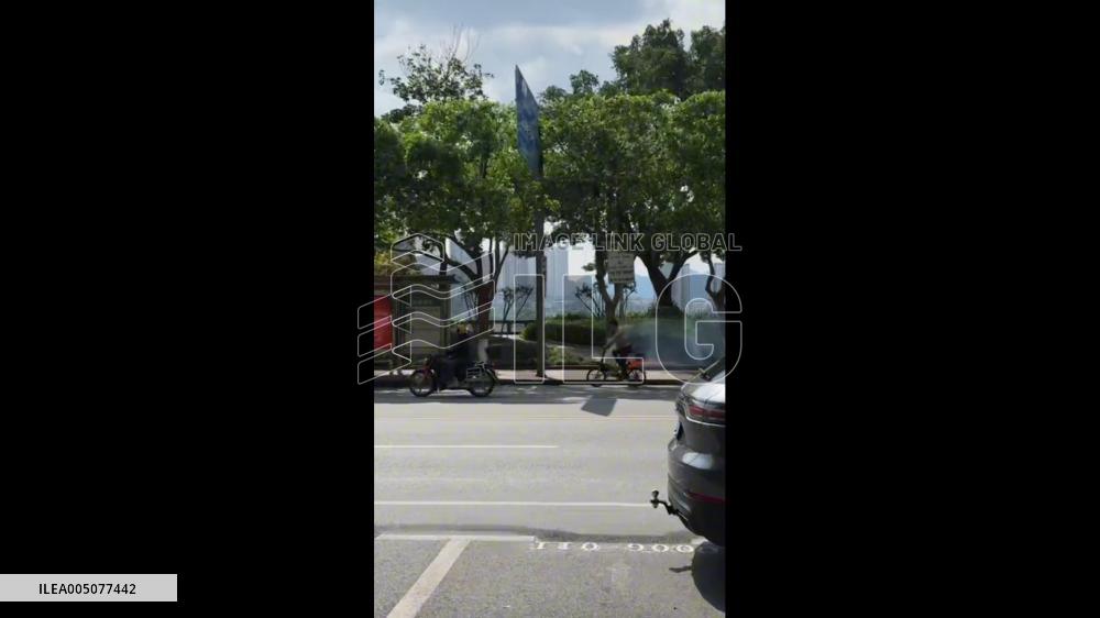 China: Burning Bicycle Left in Middle of Road After Rider Escapes in Chongqing