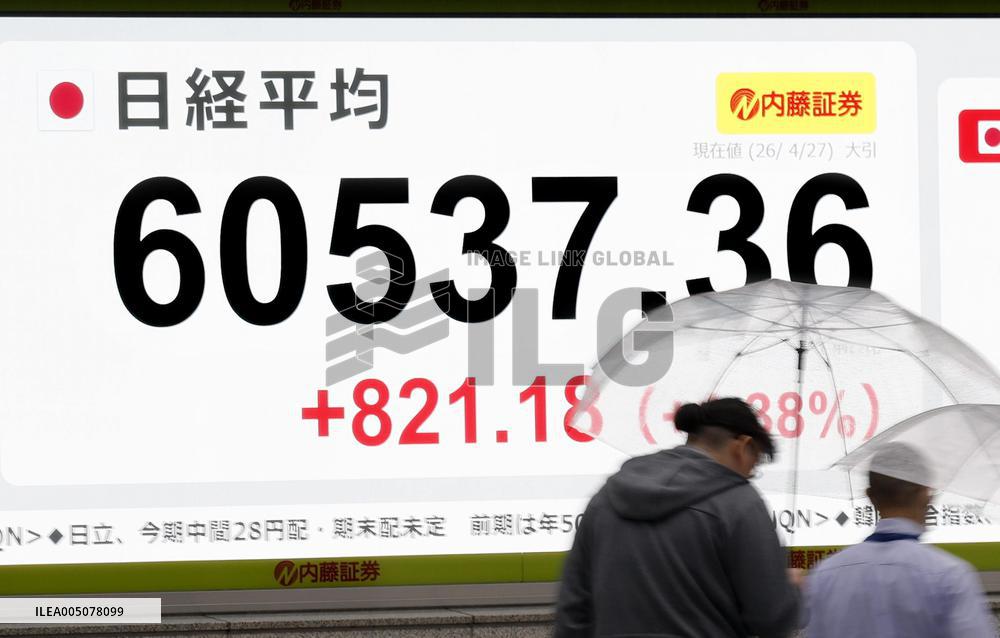 Nikkei ends above 60,000 for 1st time