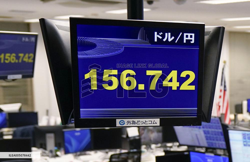 Dollar tumbles to 156 yen range