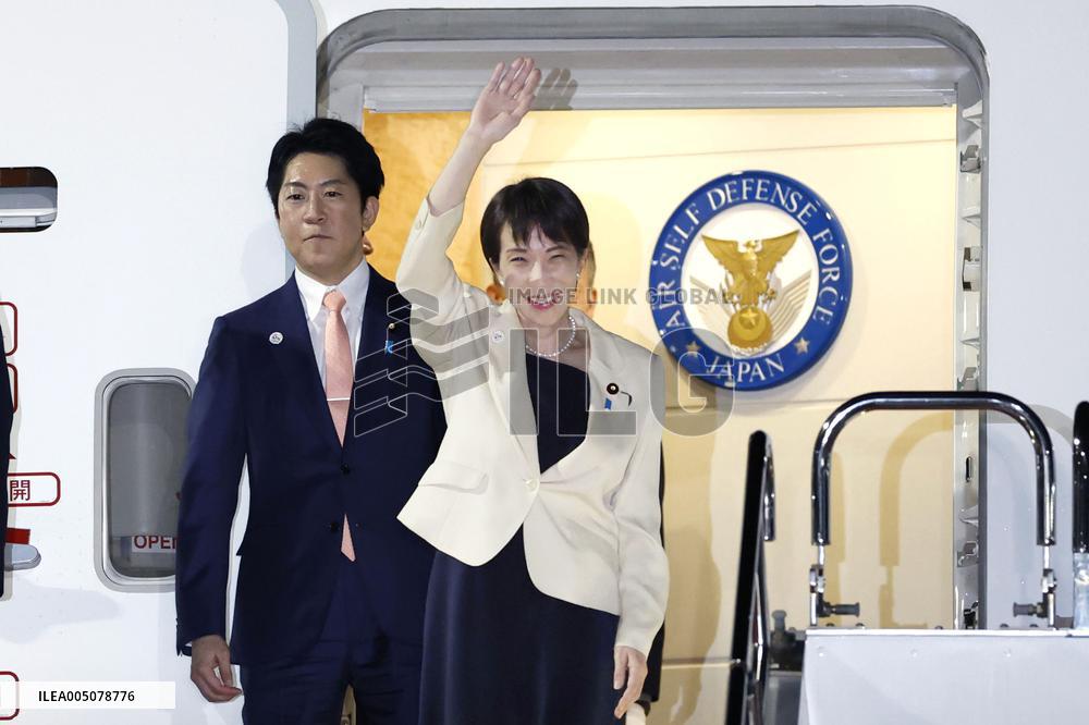 Japan PM Takaichi returns home