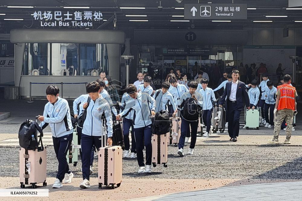 Football: North Korean team enroute to South Korea
