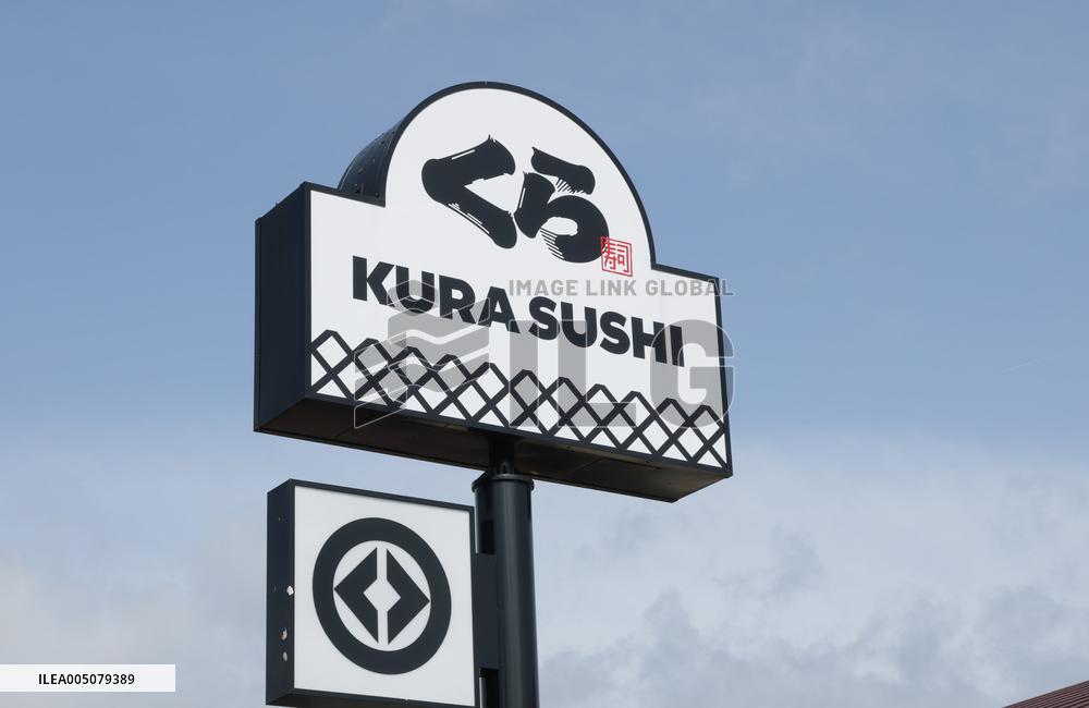 Kura Sushi signboard and logo